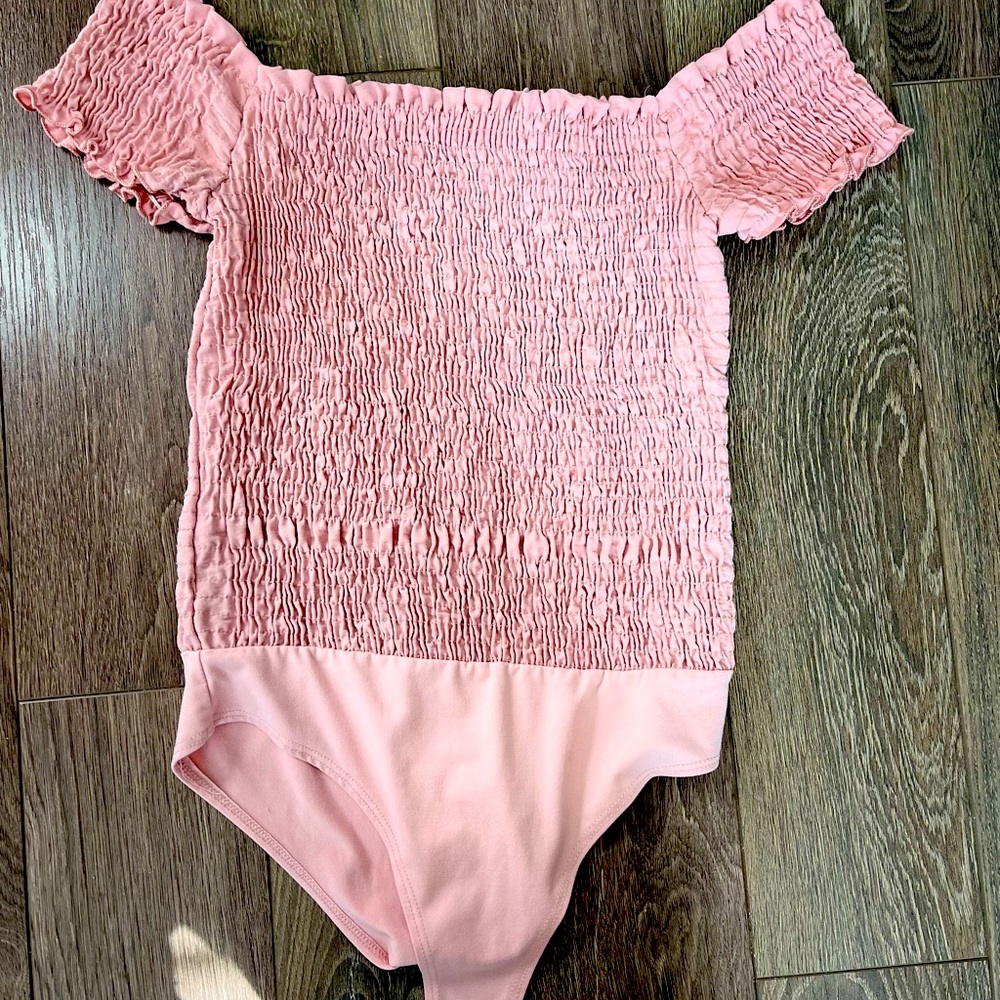 A one peice top ruffled texture